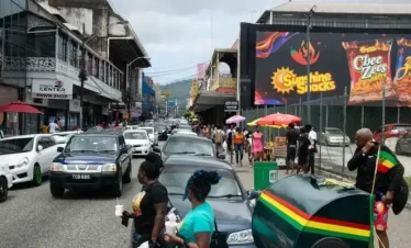 people moving through downtown frederick street in port of spain trinidad