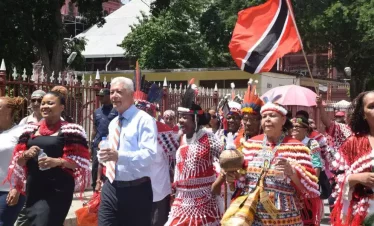 indigenous settlement celebrating in port of spain, trinidad