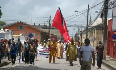 an emancipation street procession taking place in port of spain trinidad