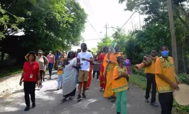 merikin street procession before river ritual-1