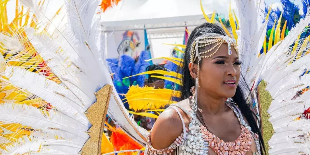 female masquerader experience the eccentric feeling of carnival tuesday in trinidad