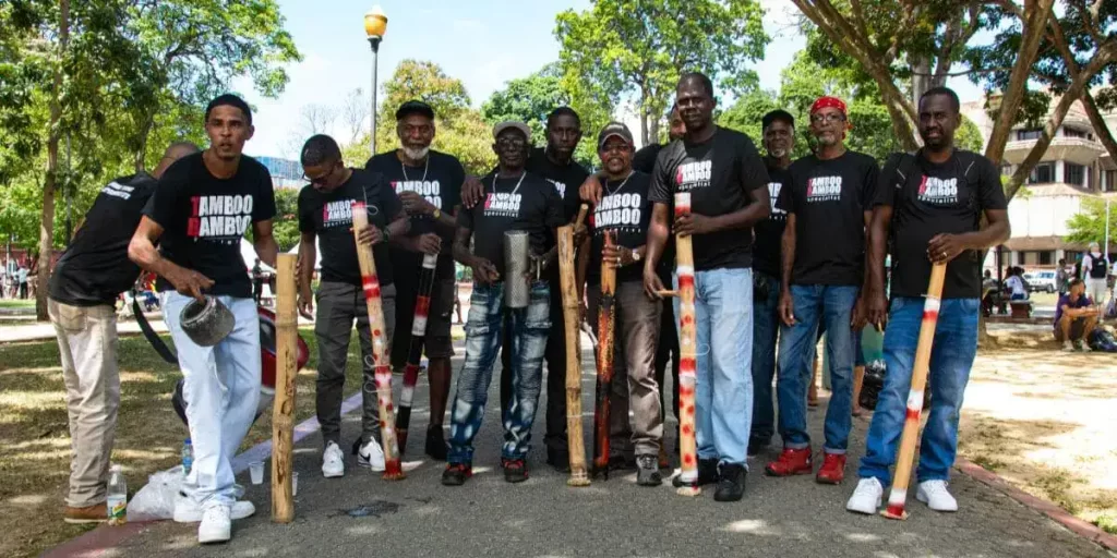 a unique experience is the tamboo bamboo band in trinidad which derived from the banning of the skin drums during slavery
