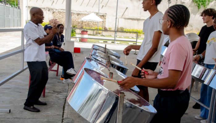 tutor carrying on the Trinidad Steelpan Workshop in Trinidad